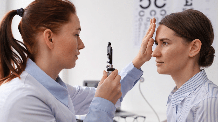 testing person with light in eye